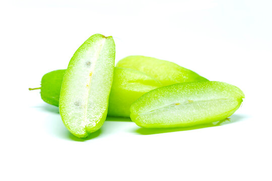 Bilimbi (Averhoa bilimbi Linn.) or cucumber fruit slice on white background