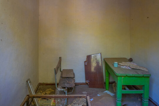 Broken interior of a village house in the Chernobyl Exclusion Zone in the Ukraine