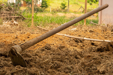Fototapeta premium A hoe on the ground.