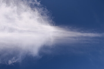 Naklejka na ściany i meble White light clouds in the blue sky background