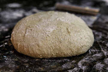 Fototapeta na wymiar High hydration rye and wheat sourdough ready for shaping artisanal rustic wholegrain sourdough bread loaf, photo series
