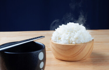 white cooked rice on bowl with hot steam