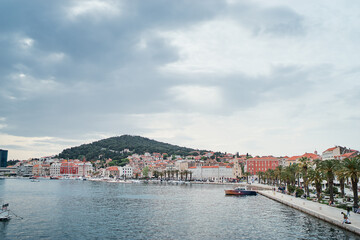 Fototapeta na wymiar Travel by Croatia. Beautiful landscape with Split Old Town and sea promenade.