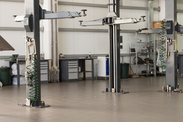 Lift with arms raised at a car service station