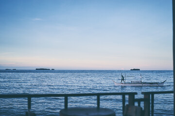 Seascape with philippines traditional fishing boat.