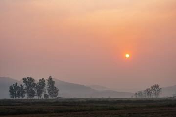 Fototapeta na wymiar he sun is rising in the morning in the north of Thailand.