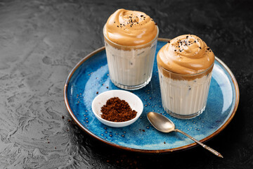Obraz na płótnie Canvas Dalgona coffee or whipped instant coffee. New popular food and drink trend.