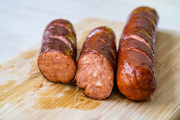 Bratwurst Sausage Filled with Emmental Cheese in Breakfast Plate.