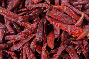 Dried red hot chili peppers, food ingredient.