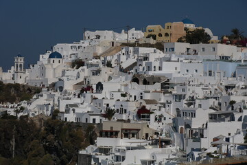 Fototapeta na wymiar Aerial panorama of white villas in Imerovigli, Santorini island, Greece