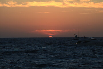 Fototapeta na wymiar Summer sunset in Santorini island in Greece