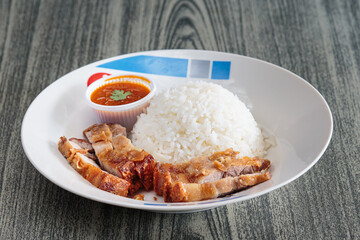 Three layers of crispy pork with rice.