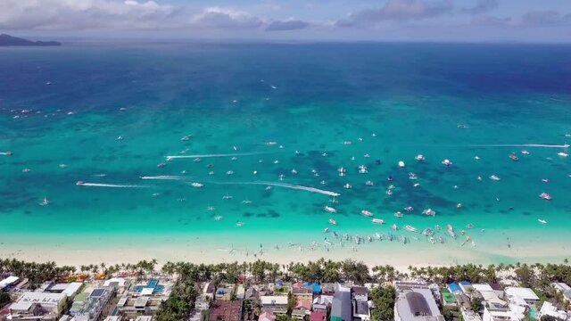 Boracay Coastline with Blue and White Sailing Boats on the Sea in a Sunny Day, The Philippines, Southeast Asia.