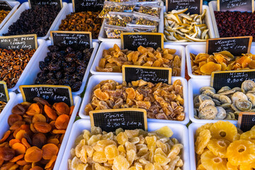 Various dried fruits for sell in a market stall at the Corus Saleya, Nice, France
