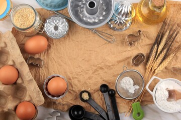 Baking Background with Baking Ingredients such as Egg, Sesame Seed, Flour, Oil, and Baking Utensils. Suitable for Background or Wallpaper