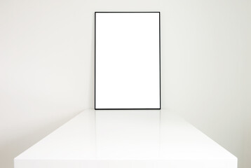 White paper in a frame, a poster in a white studio room, a layout template for adding your text.