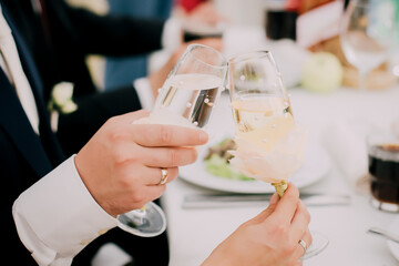 Guests at the wedding drink champagne for the newlyweds