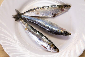 plate of fresh sardines on the plate