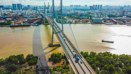 Fototapeta premium Drone view of Phu My bridge in District 2. Ho Chi Minh city, Vietnam