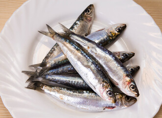 plate of fresh sardines on the plate