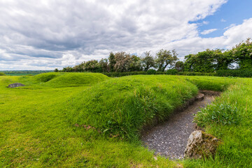 Fototapeta na wymiar Knowth Neolithic Passage Mound Tombs in Boyne Valley, Ireland