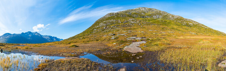Panoramic view of the mountains and hills between Ersfjorden and Kaldfjorden fjords on the island of Kvaloya, Norway