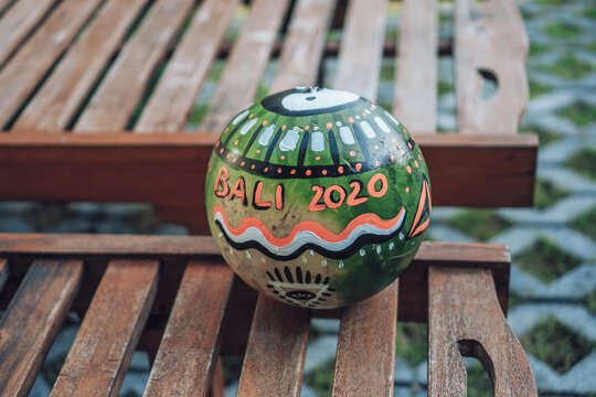 watermelon with the eye of providence symbol in a triangle and with the inscription bali 2020
