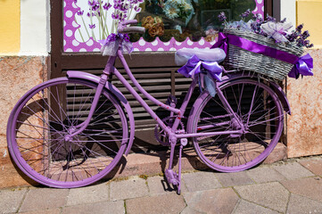 Fototapeta na wymiar Lilac bike in Gyor, Hungary. Gyor has a beautiful baroque old city.