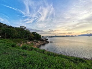 A beautiful landscape capture of nature photography. Evening sky full of shady white clouds is...