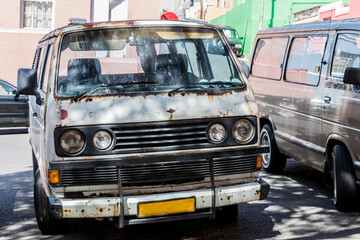 Old dirty rusted van car, Bo-Kaap district, Cape Town.