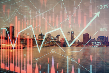 Financial graph on night city scape with tall buildings background double exposure. Analysis concept.