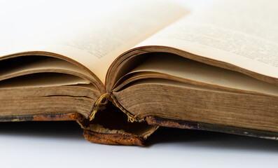Open antique brown leather cover book