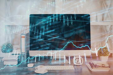 Forex graph hologram on table with computer background. Double exposure. Concept of financial markets.