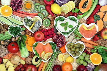 Immune boosting vegan health food collection with foods high in protein, smart carbs, anthocyanins, vitamins, minerals, antioxidants, omega 3 and fibre. Healthy ethical eating concept.  Flat lay.
