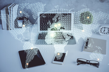 Double exposure of business theme icons and work space with computer background. Concept of success.