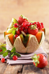 fresh fruit salad in melon bowl
