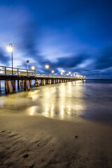 Obraz premium Stormy sunrise over the baltic sea in Gdynia Orlowo, Poland