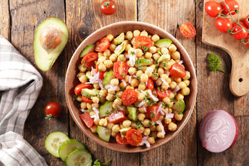 gourmet chickpea salad with cucumber, avocado and tomato