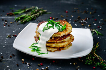 potato pancake with sour cream