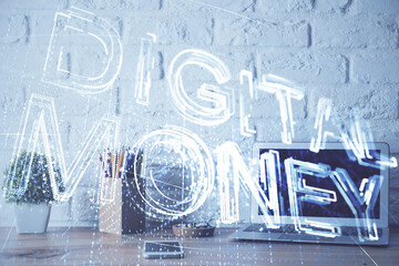 Multi exposure of blockchain and crypto economy theme hologram and table with computer background. Concept of bitcoin cryptocurrency.