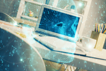 Double exposure of work space with computer and human brain drawing hologram. Brainstorm concept.