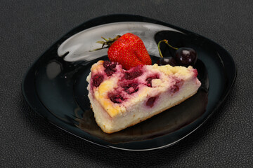 Cheesecake with cherry served strawberry