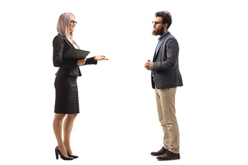 Bearded man and a businesswoman talking