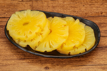 Marinated pineapple rings in the bowl