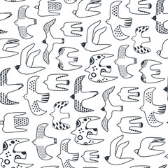 Fototapeta premium Vector seamless pattern with flock of flying birds isolated on white background. Doodle style for textile, wrapping paper, background flat design.