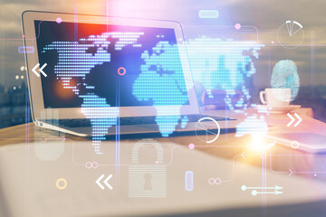 Multi exposure of table with computer and world map hologram. International data network concept.