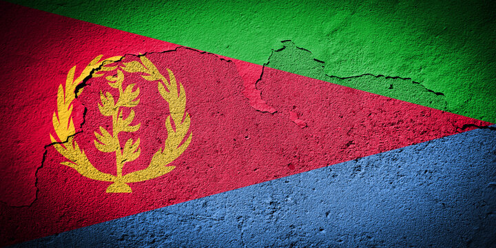 Eritrea flag on cracked wall