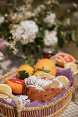 Muffins in a fruit basket. Picnic in the Park on the green grass with fruit, Lemonade