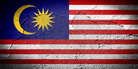 Malaysia flag on cracked wall