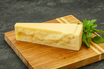 Hard parmesan cheese served basil